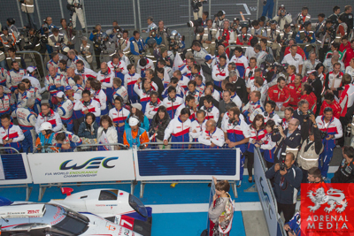 Fans celebrate after Anthony Davidson (GBR) / Nicolas Lapierre (FRA) / Sebastien Buemi (CHE) / drivers of car #8 LMP1 Toyota Racing (JPN) Toyota TS 040 - Hybrid  win at Fuji Speedway - Shizuoka Prefecture - Japan