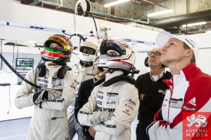 Brendon Hartley (NZL) and Romain Dumas (FRA) watch the the screens in the Porsche Garage  Qualifying - LMP1 & LMP2 - 6 Hours of Shanghai at Shanghai International Circuit - Shanghai - China